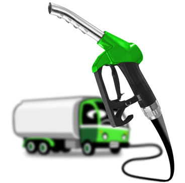 Oil prices constantly fluctuate due to various determining factors petrol pump attached to oil truck in backround